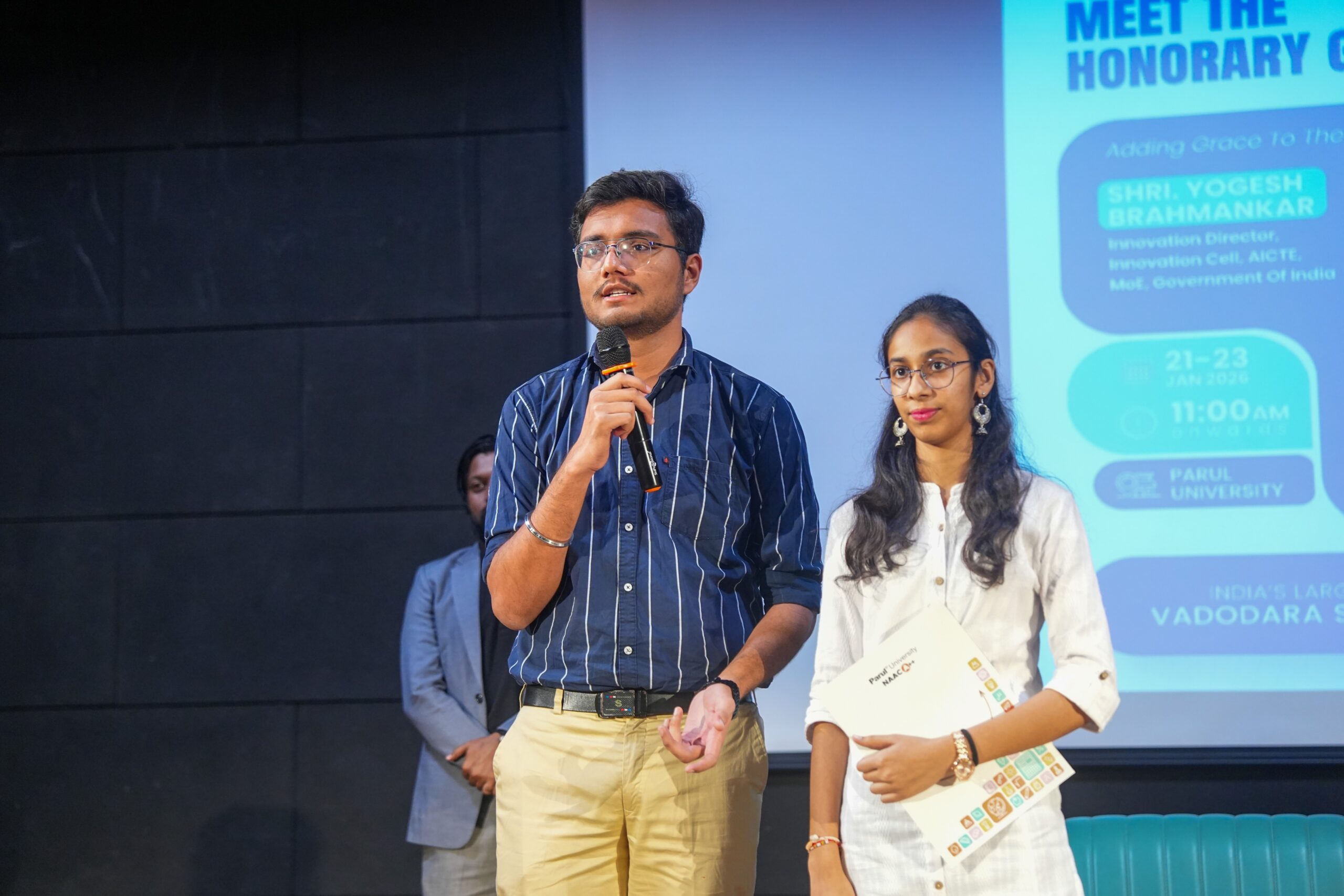 Student founder discussing product with customer on campus