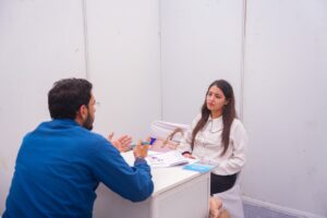 Student founder discussing startup idea on Parul University campus