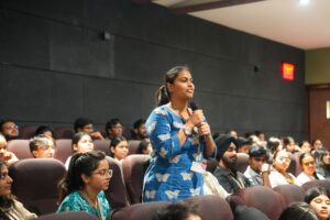 Student founder tracking first sales on laptop in campus hostel