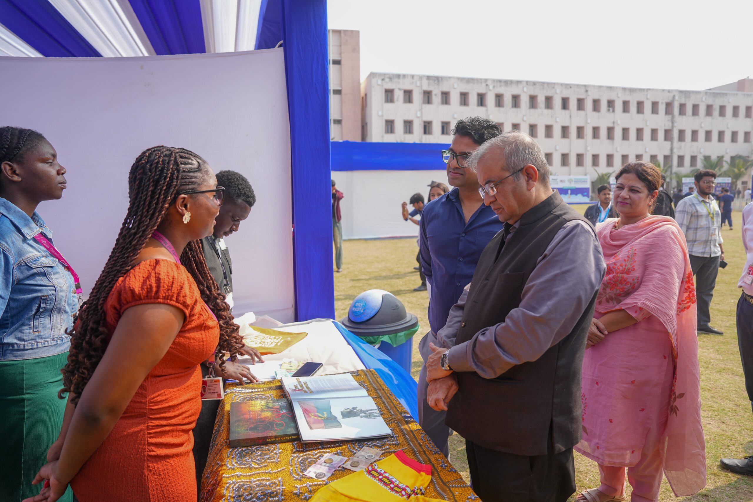 Student pitching startup to investors at campus event.